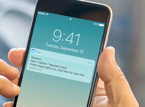 Samsara phone alert sent through email for fleet management showing that a fleet vehicle has a check engine light on.